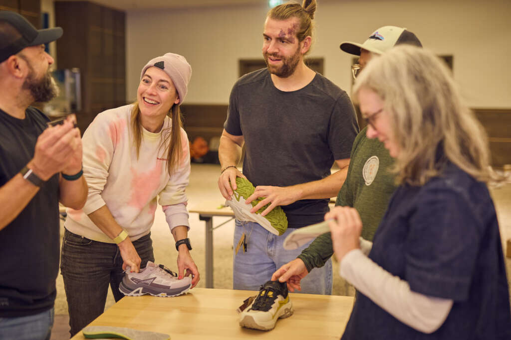 Members of the Collaborators Club testing shoes